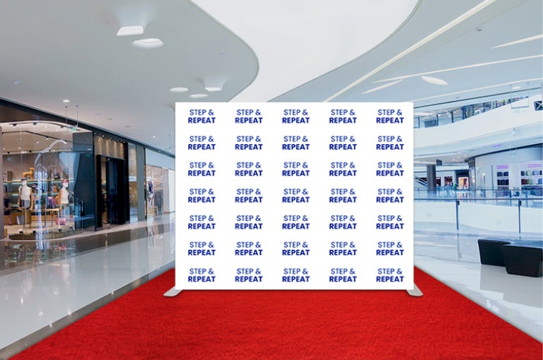 Stepping Up Your Branding Game: Unleashing the Power of Step and Repeat Backdrops for Maximum Business Visibility